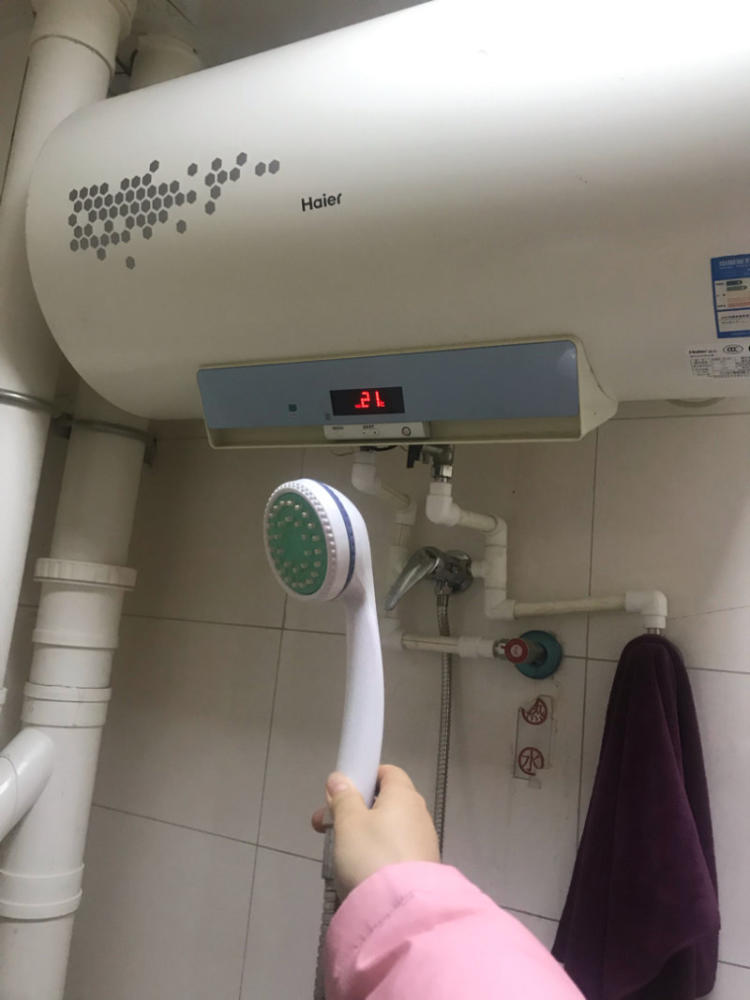 海尔电热水器出热水少_济南海尔热水器维修_济南海尔维修电话